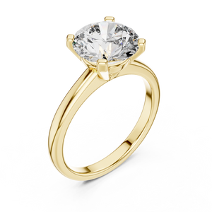 Yellow gold lab grown diamond round cut double-prong solitaire ring, angled view — Luzora Jewels