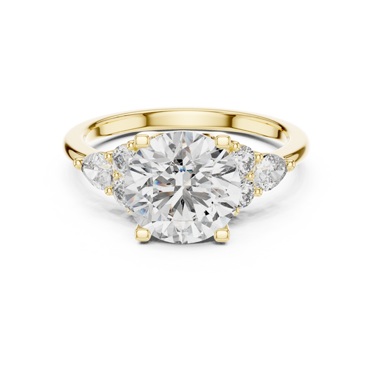 White gold lab grown diamond round cut ring with pear accents, angled view — Luzora Jewels