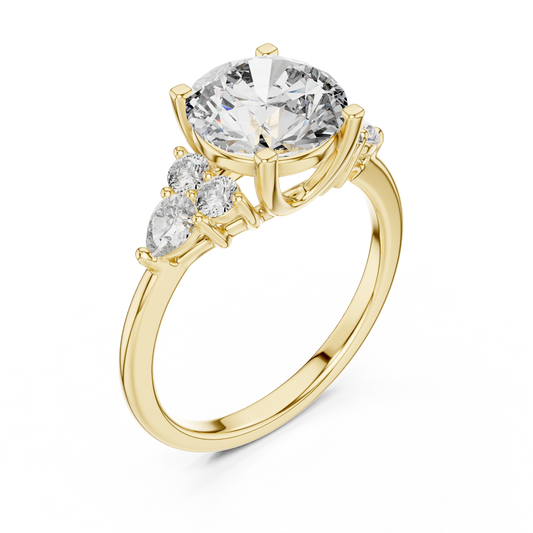 Yellow gold lab grown diamond round cut ring with pear accents, angled view — Luzora Jewels