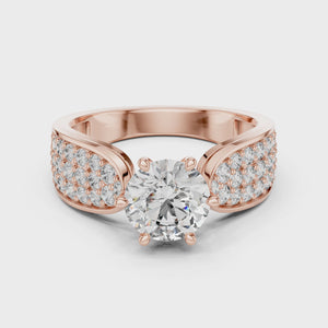 Close-up 360-degree video of a rose gold split shank engagement ring featuring a round 1.00 CT lab-grown diamond center stone and pavé-set diamond accents.