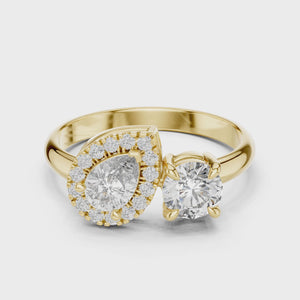 1 CT Toi et Moi Pear & Round Lab Grown Diamond Ring in yellow gold — 360 spin video by Luzora Jewels