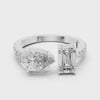 A video showcasing a luxury Toi et Moi lab-grown diamond engagement ring crafted in solid white gold, highlighting a 0.86 carat emerald-cut diamond and a 1.00 carat pear-shaped diamond on a pavé accented open band.
