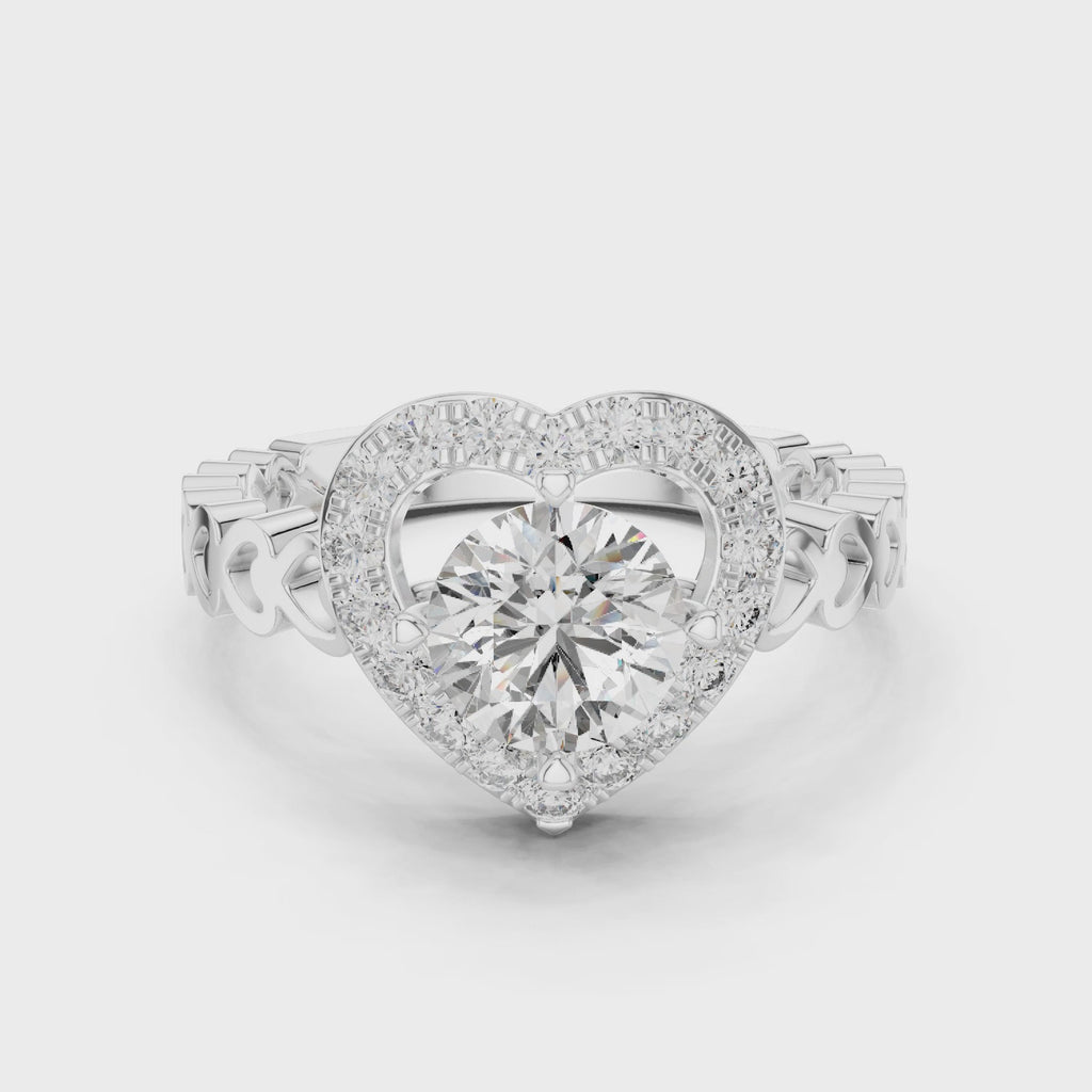 1.32 CTW round lab-grown diamond engagement ring with a heart-shaped halo and open-heart band