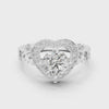 1.32 CTW round lab-grown diamond engagement ring with a heart-shaped halo and open-heart band