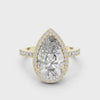 360-degree view of a pear-cut diamond halo engagement ring in yellow gold