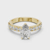 Video of a 1.10 CT pear cut lab grown diamond engagement ring with pave band in yellow gold