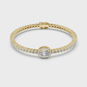 Video of yellow gold oval halo lab grown diamond tennis bracelet