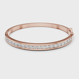Video of the 3.46 CTW round lab grown diamond channel-set bangle bracelet rotating to show the continuous diamond line