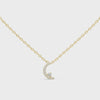 Yellow gold crescent moon pendant necklace video featuring graduated lab-grown diamonds.