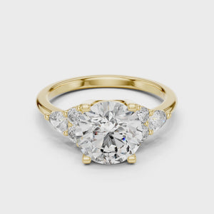 2.5 CT Round Diamond Ring with Pear Accents