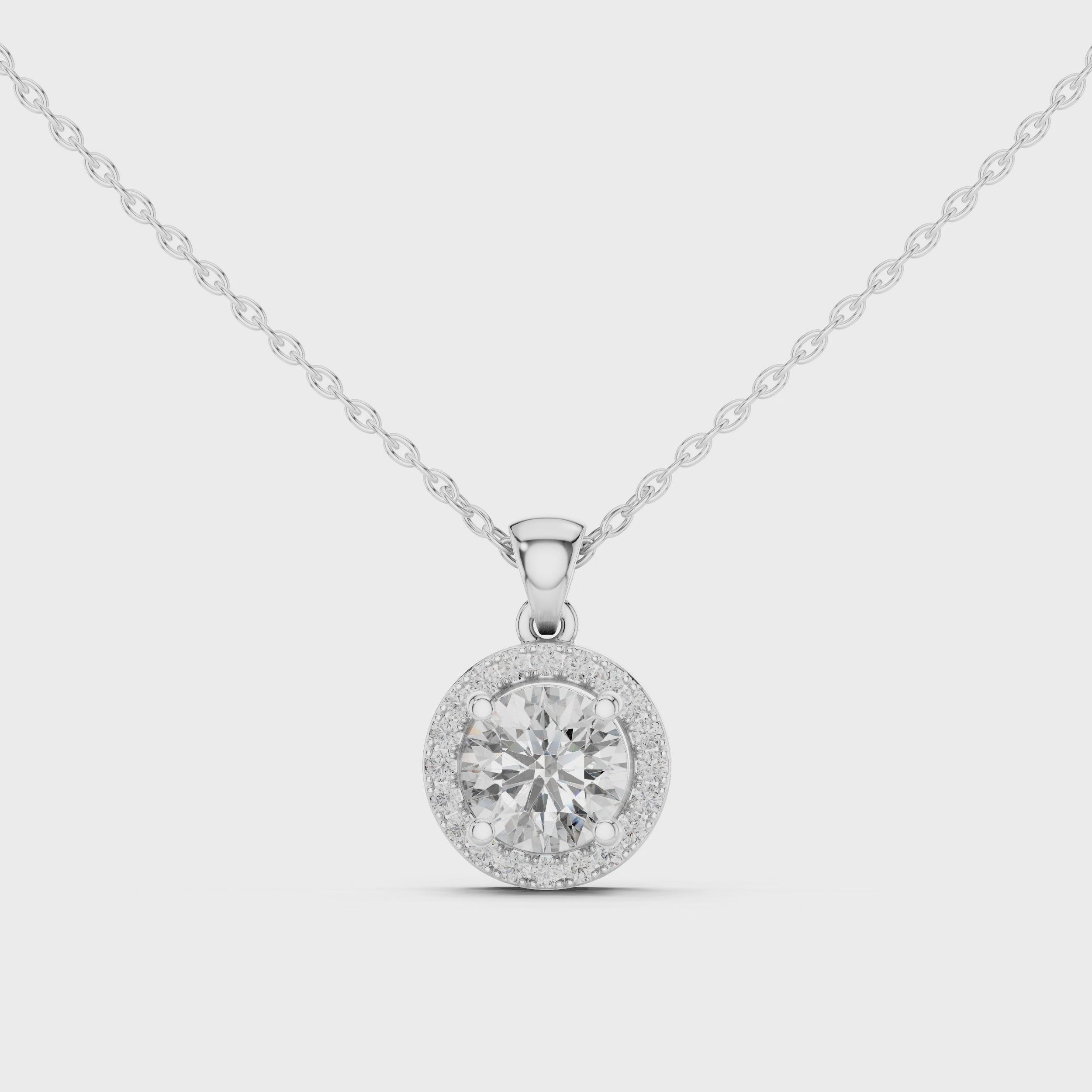 Video of white gold round solitaire lab-grown diamond halo pendant