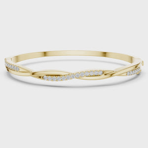 Video of yellow gold twisted diamond bangle bracelet