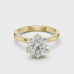 Yellow gold round solitaire lab-grown diamond engagement ring with six-prong setting video