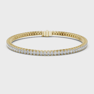 Video of yellow gold oval cut diamond tennis bracelet
