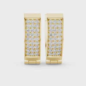 Video of yellow gold lab grown diamond three-row pavé huggie hoop earrings