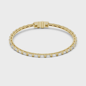 Video of yellow gold baguette lab grown diamond tennis bracelet