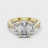 360 degree video of yellow gold three-stone emerald cut diamond ring