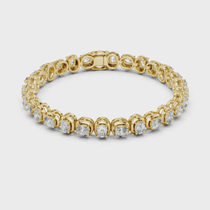 Video of yellow gold east west cushion cut lab grown diamond tennis bracelet