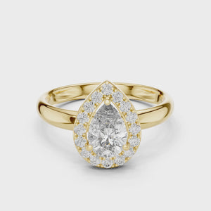 0.70 CT pear cut lab grown diamond halo engagement ring in yellow gold video
