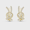 Video of yellow gold lab grown diamond love knot huggie earrings