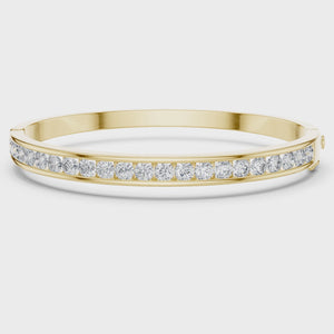 Video of yellow gold channel set diamond bangle bracelet